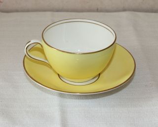 Vintage Aynsley Yellow Gold And White Teacup And Saucer