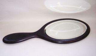 Antique/vintage 1920s Ebony Wood Oval Hand Mirror With Bevelled Mirror Glass