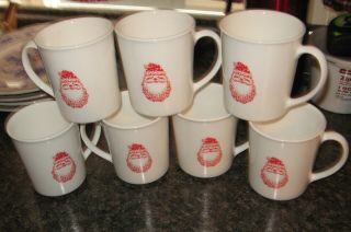 7 - Vintage Corning Christmas Red Santa Claus Coffee Mugs