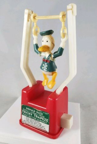 Vintage Kohner Bros Walt Disney Donald Duck Tricky Trapeze Push Button Toy 4995