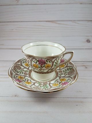 Vintage Rosina Bone China Teacup And Saucer Gold Brown With Flowers Elegant