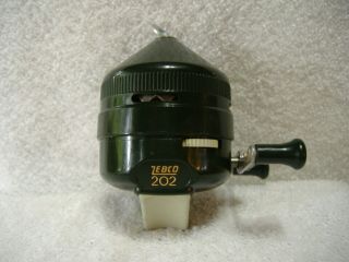 Vintage Dark Green Zebco 202 Fishing Reel With Metal Shoe And