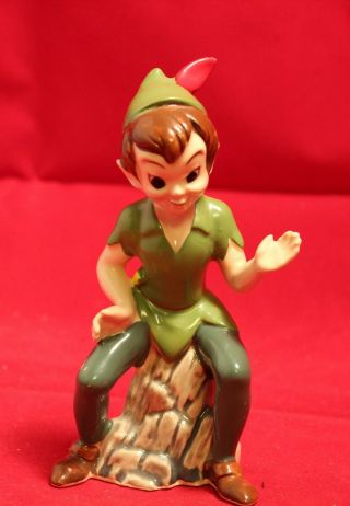 Vintage Walt Disney - Peter Pan Sitting On Rock.  Collectable Figurine Ceramic 5 "