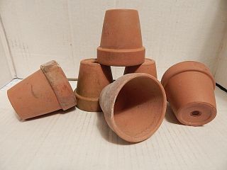 Four Vintage Small Clay Pots