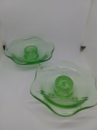 2 Vintage Footed green depression glass candle holders. 2