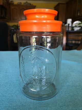 Anchor Hocking Clear Glass Jar Orange Lid Wheel Decorative Vintage Canister
