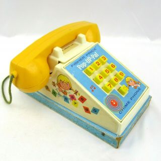 Vintage 1968 Fisher Price Pop Up Pal Chime Phone Toy 150 Blue Dress