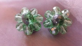 Vintage Clip In Earrings Green Glass Flowers Approx 1 " In Size.  Very Pretty
