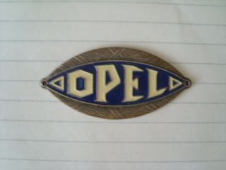 Vintage Opel Car Badge.  Blue & White Enamel On Ornate Brass Base.  Looks Old