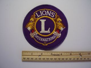 Vintage Fabric Patch Lions International 4 3/4 " Purple Background