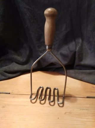 Vintage Potato Masher With Ornate Wooden Handle