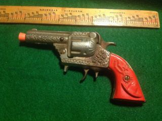 Vintage Gene Autry " Bulls Eye " Cast Iron Cap Gun With Red Grips By Kenton