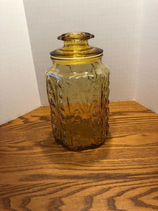 Vintage Amber Atterbury Scroll Canister 9 "