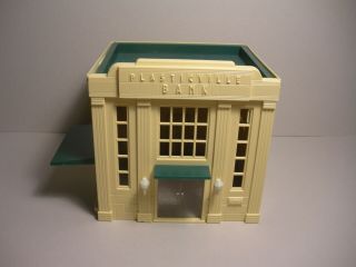 VINTAGE PLASTICVILLE BANK (0700),  BUFF WALLS,  GREEN ROOF/TRIM,  WITH 2