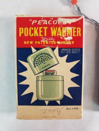 Vintage Pocket Warmer by PEACOCK with paperwork and velvet carry bag 2