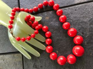 Vintage 26 " Larger Towards Center Red Plastic Round Beaded Necklace