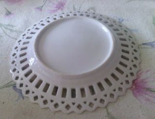 Vintage plate with strawberries and cut outs on the rim,  7 inches in diameter. 2