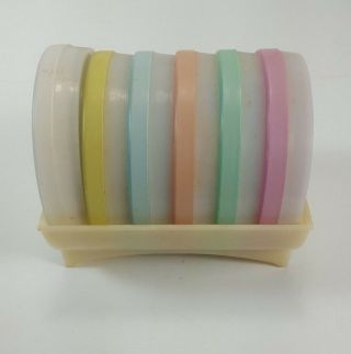 Vintage Tupperware Pastel Color Wagon Wheel Coasters With Holder