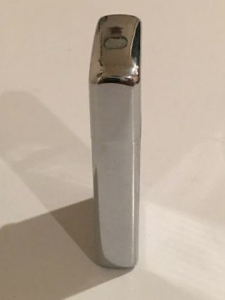 Vintage Zippo Slim Lighter With Chrome Case. 4
