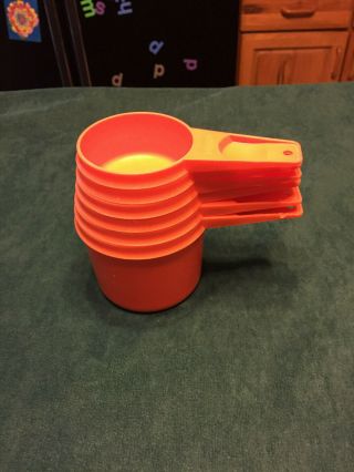 Vintage Pre - Owned Set Six (6) Tupperware Measuring Baking Cups Orange Color