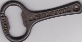 " Three In One " / " Three In One " Vintage Cast Iron Bottle Opener