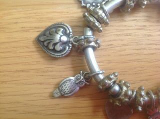 An Unusual Vintage Silver - Toned Charm Bracelet with 10 unusual Charms 3