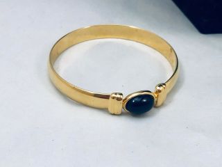 Vtg.  Monet Black Oval Cabochon & Shiny Gold Tone Hinged Bracelet