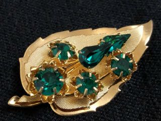 Vintage Gold Coloured Leaf Brooch With Green Stones