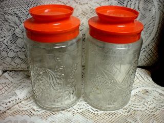 (2) Vintage Anchor Hocking Floral Sculpted Glass Jars Orange Screw On Lid