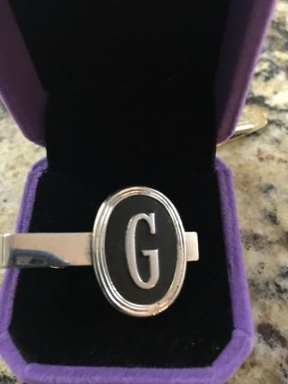 Vintage Swank Tie Clasp Silver Tone With Letter G On Black Background