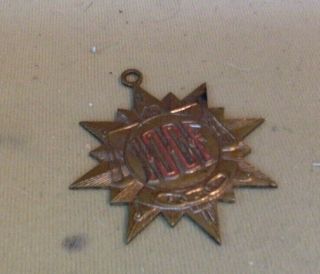 Vintage Brass Pendant.  Independent Order Of Odd Fellows.