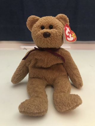 Ty “curly” Beanie Baby - - Retired