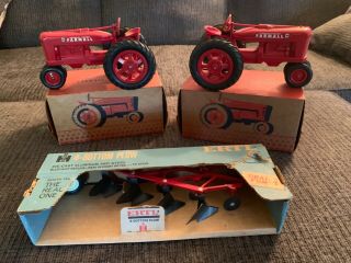 2 International Harvester Product Miniature Farmall M’s And Plow Blue Box