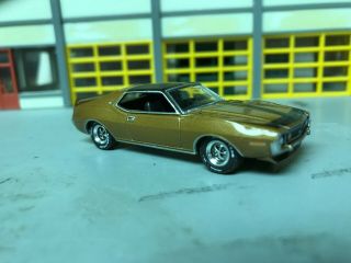 1/64 1973 Amc Javelin Amx In Gold With Black Int With A 401 4 Speed/goodyear 