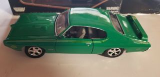 Green 1969 Pontiac Gto Judge 1:24 Motormax Diecast Car.