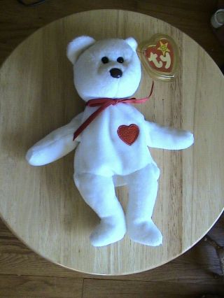 Ty Beanie Baby White Teddy Bear With A Red Heart.