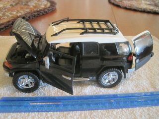 Jada Toys 1/24,  Metal,  " Toyota Fj Cruiser ",  Black & White,  Cool Suv Type Vehicle.