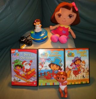 Fisher Price Nickelodeon Dora The Explorer Plug & Play,  2 Dora Dolls,  3 Dvd 