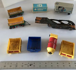 9 - Total - 1950’s Plastic & Tin Toy Trailers