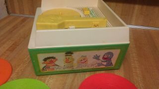 Vintage Fisher Price Sesame Street Record Player,  5 records,  great,  gd 2