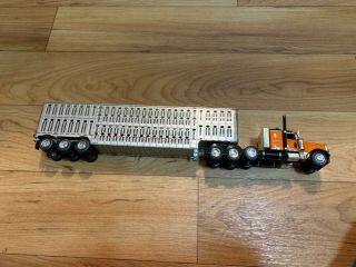 1/64 Dcp Peterbilt Black And Orange Try Axle Truck And Cattle Trailer