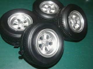 Mag Wheels With Knock Offs Over Rubber Tires Salvaged 