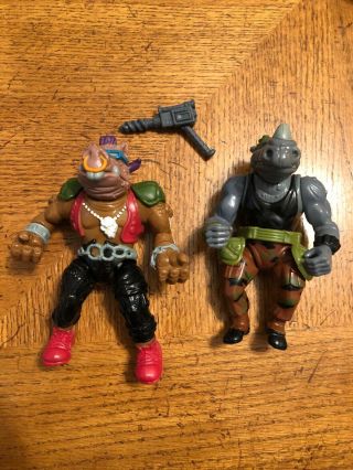 Vintage 1988 Tmnt Rocksteady And Bebop Action Figures,  With 1 Belt And 1 Weapon