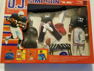 Shindana Toys - 1975 - - O.  J.  Simpson Doll - 9 " Football Jersey Cleats Set Plus More