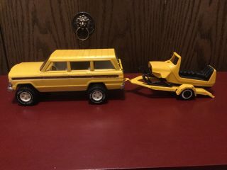 Vintage Tonka Yellow Jeep Wagoneer,  Trailer,  And Snowmobile.
