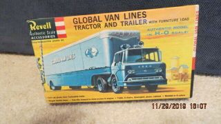 Revell H.  O.  Scale Global Van Lines Tractor & Trailer Model Kit.