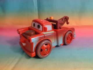 2005 Disney Pixar Tow Matter Shake N Go Motorized Car - -