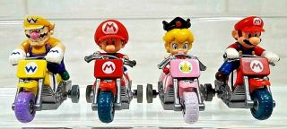 Set 4 Nintendo Mario Kart Pull Back Bike Figure Wario Baby Daisy Baby Mario