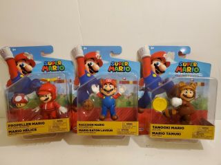 World Of Nintendo 4 - Inch Action Figure - Racoon Mario,  Propellor Mario & Tanooki