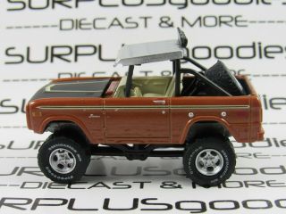 Greenlight 1:64 Scale Loose Collectible 1972 Ford Bronco 4x4 Lifted Diorama Car